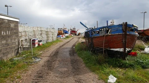 E Camera moves through old traditional fishing area 4K Video stock 117841086