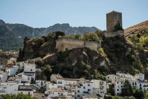 E Cazorla, Spain. image of "La Yedra" Castle with village trees and houses Stock Photos