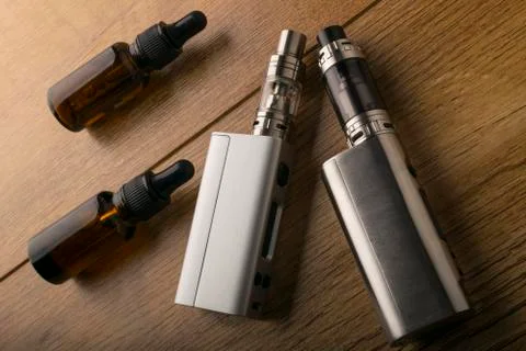 E cigarette or electronic cigarette for vaping mods. Stock Photos