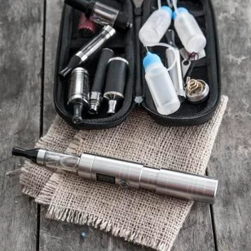 E-cigarette on table Stock Photos