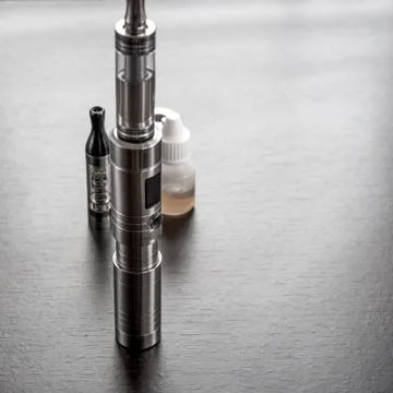 E-cigarette on table Stock Photos