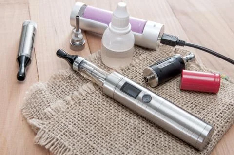 E-cigarette on table Stock Photos