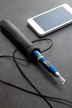 E cigarette on table Stock Photos