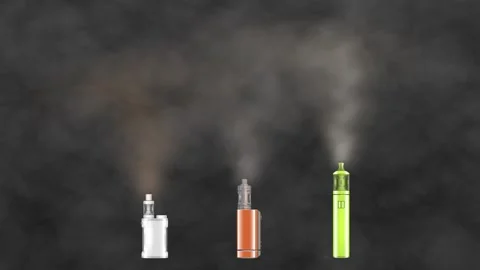 E-cigarettes of different models emit smoke against a dark background. Anima Stock Footage 272984738
