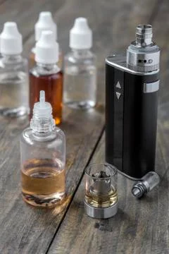 E-cigarettes with different re-fill bottles Stock Photos