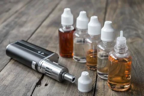 E-cigarettes with different re-fill bottles Stock Photos