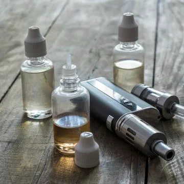 E-cigarettes with different re-fill bottles Stock Photos