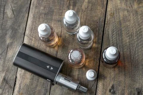 E-cigarettes with different re-fill bottles Stock Photos