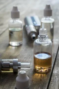 E-cigarettes with different re-fill bottles Stock Photos