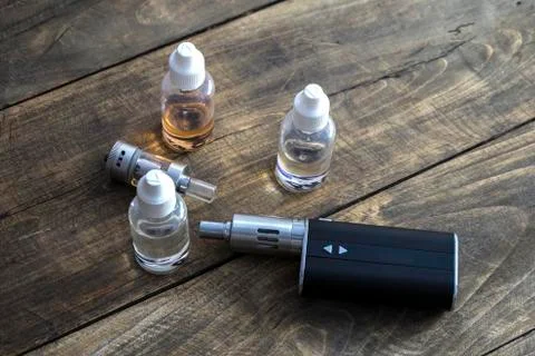 E-cigarettes with different re-fill bottles Stock Photos
