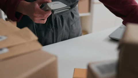 E-commerce, Small business owner Confident working in a courier service room Stock Footage 233812869