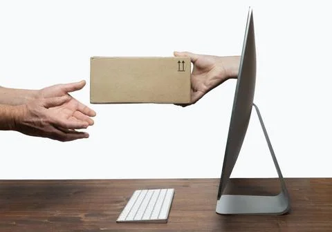 E-commerce time delivering a parcel from a computer screen Copyright: xZoo... 스톡 사진