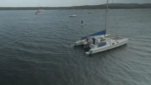 E-Foil Riders Gliding Between Yachts Near Fornells, Menorca, Spain Stock-Footage 344417363