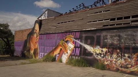 E Graffiti on burnt out building drone 4K Video stock 113123812