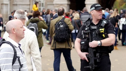 E Intimidating British policeman armed in London 4K Stock Footage 124296922