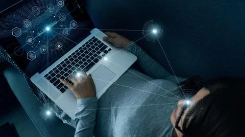 E-Learning with abstract woman using a laptop on digital interface. 스톡 사진