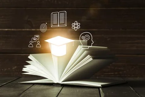 E learning and education concepts with open book and icons in a classroom Stock Photos