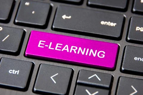 E-learning and online concept - Laptop keyboard with pink E-Learning button. Stockfoto's