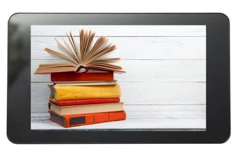 E-learning concept. Digital library - books inside tablet pc. Copy space for Stock Photos