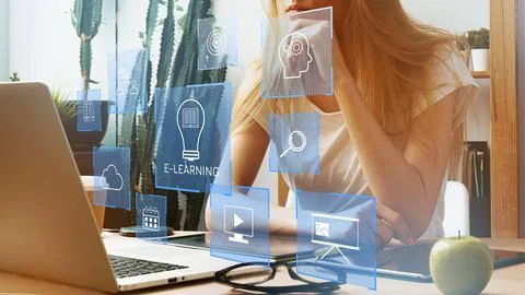 E learning concepts displayed on a digital screen in a modern workspace with a Stock Photos