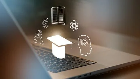 E learning concepts displayed on a laptop keyboard with various educational Stock Photos