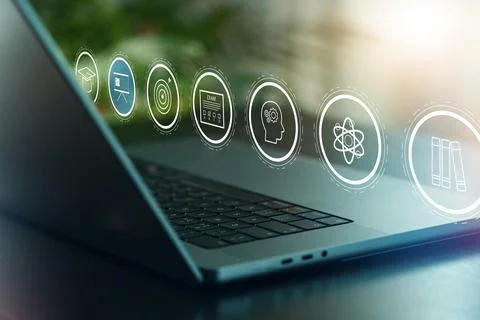 E learning concepts displayed on a laptop screen with focus on education and Stock Photos