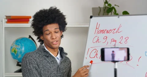 E-learning education concept, african american guy student responds to test from Stock Footage 151646568