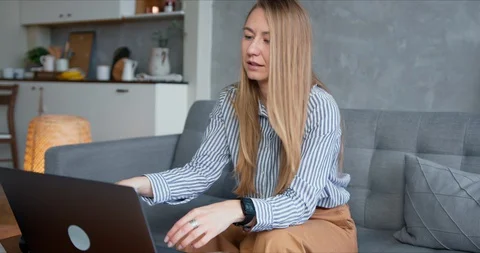 E-learning from home. Happy young positive Caucasian tutor woman leads classes Stock Footage 129073188