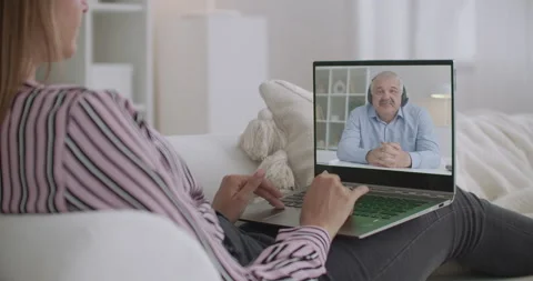 E-learning at home by video chat, female student is listening lecture of middle Stock-Footage 138206082