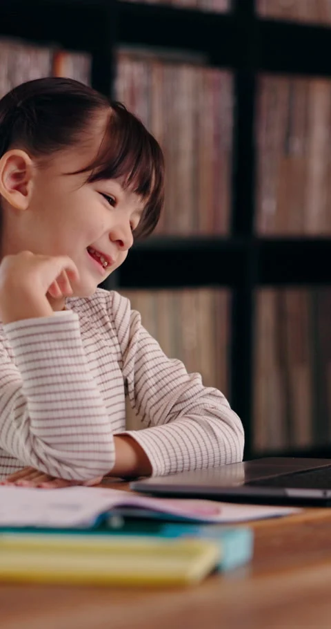 E learning, laptop or kid in home with video call, online class or intro wave on Stock Footage 340971863