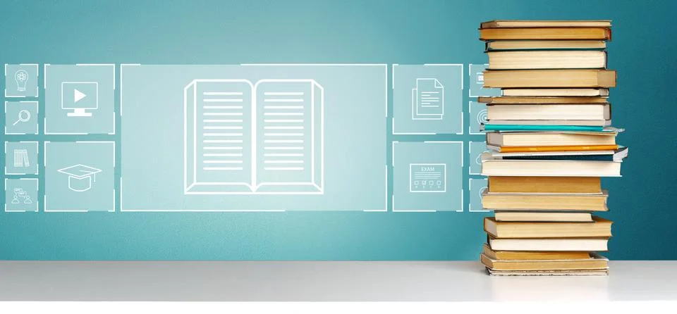 E learning materials on a table with books and digital icons in the background Stock Photos