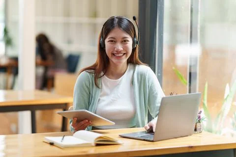E-learning Online Education concept. Asian woman attentive student video Stock Photos