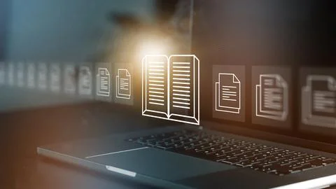 E learning tools and resources displayed on a laptop in a modern workspace Stock Photos
