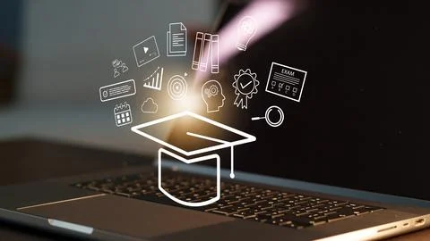 E learning tools and symbols surrounding a laptop in a study environment Stock Photos