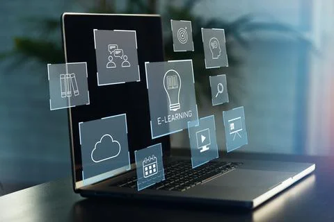 E learning tools appear on a laptop screen showing icons related to online Stock Photos