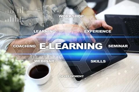 E-Learning on the virtual screen. Internet education concept. Фото