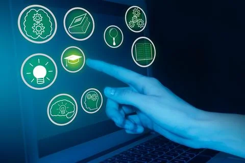 E-learning. Woman using virtual screen with different icons near laptop, cl.. Stock Photos