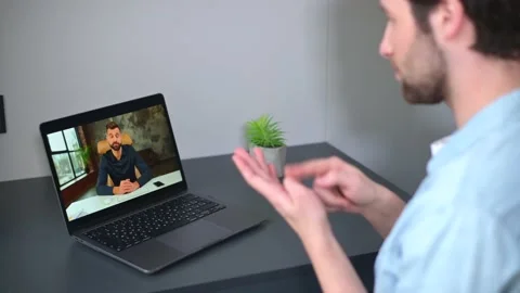 E-learning. Young man using laptop computer for watching online courses Stock Footage 201247883