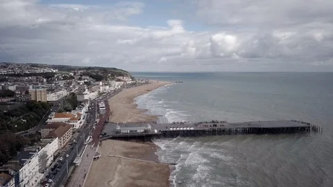 E Looking down on Hastings seaside town in the UK 4K Stock Footage 117056810
