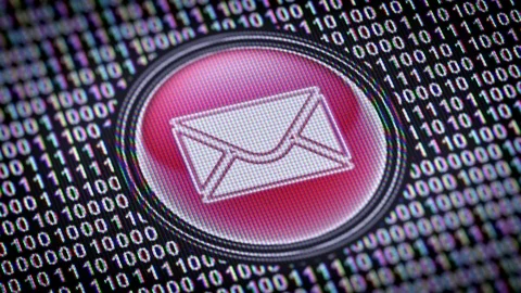 E-mail icon. Binary code ( array of bits ) in the screen. Looping footage Stock Footage 110621067