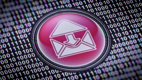 E-mail icon. Binary code ( array of bits ) in the screen. Looping footage Stock Footage 110727982