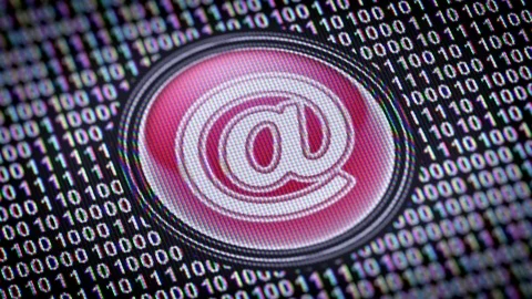 E-mail icon. Binary code ( array of bits ) in the screen. Looping footage Video stock 110728010