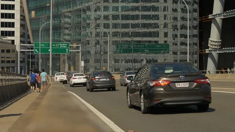 E Reflections and road signs in Sydney city centre slow motion 4K Stock Footage 124772697