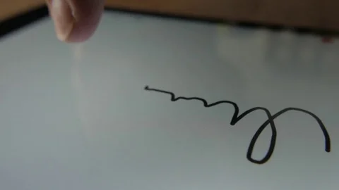 E-signature, Man signing name on tablet with finger Stock Footage