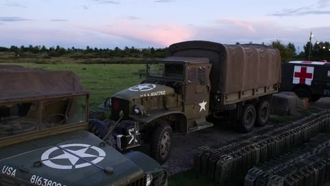 E Small jib US 2nd world war jeep and lorry in rural setting 4K Stock Footage 116252407