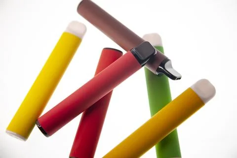 E-SMOKE. E-VAPE. Electronic cigarette sticks isolated on white background. Stock Photos