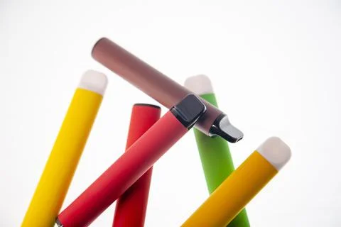 E-SMOKE. E-VAPE. Electronic cigarette sticks isolated on white background. Stock Photos