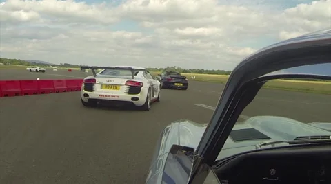 E-type Jaguar onboard camera on race track Pt 2 Stock Footage 54119773