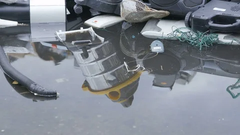 E-Waste Reflection in Water Stock-Footage 77715830