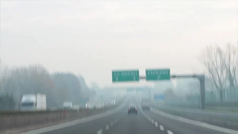 E45 napoli ceprano green white sign on above highway with down arrows Stock Footage 252148347